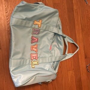 Stoney Clover duffle bag with travel patches color teal